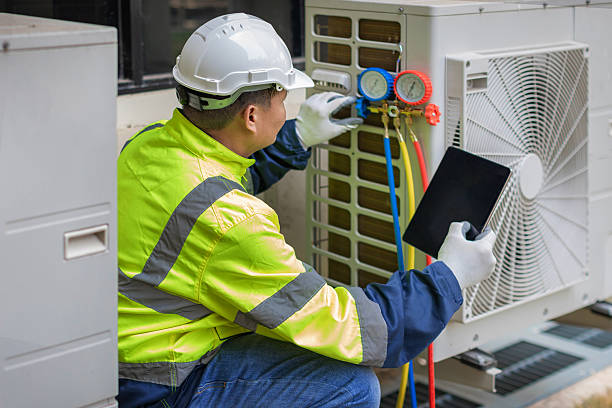 Professional Hvac technician working in Newfields, NH
